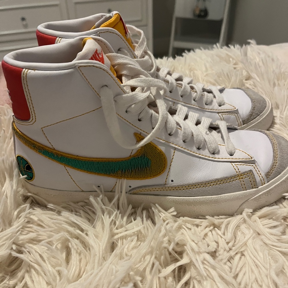 Nike White High-Tops with Red and Yellow Accents